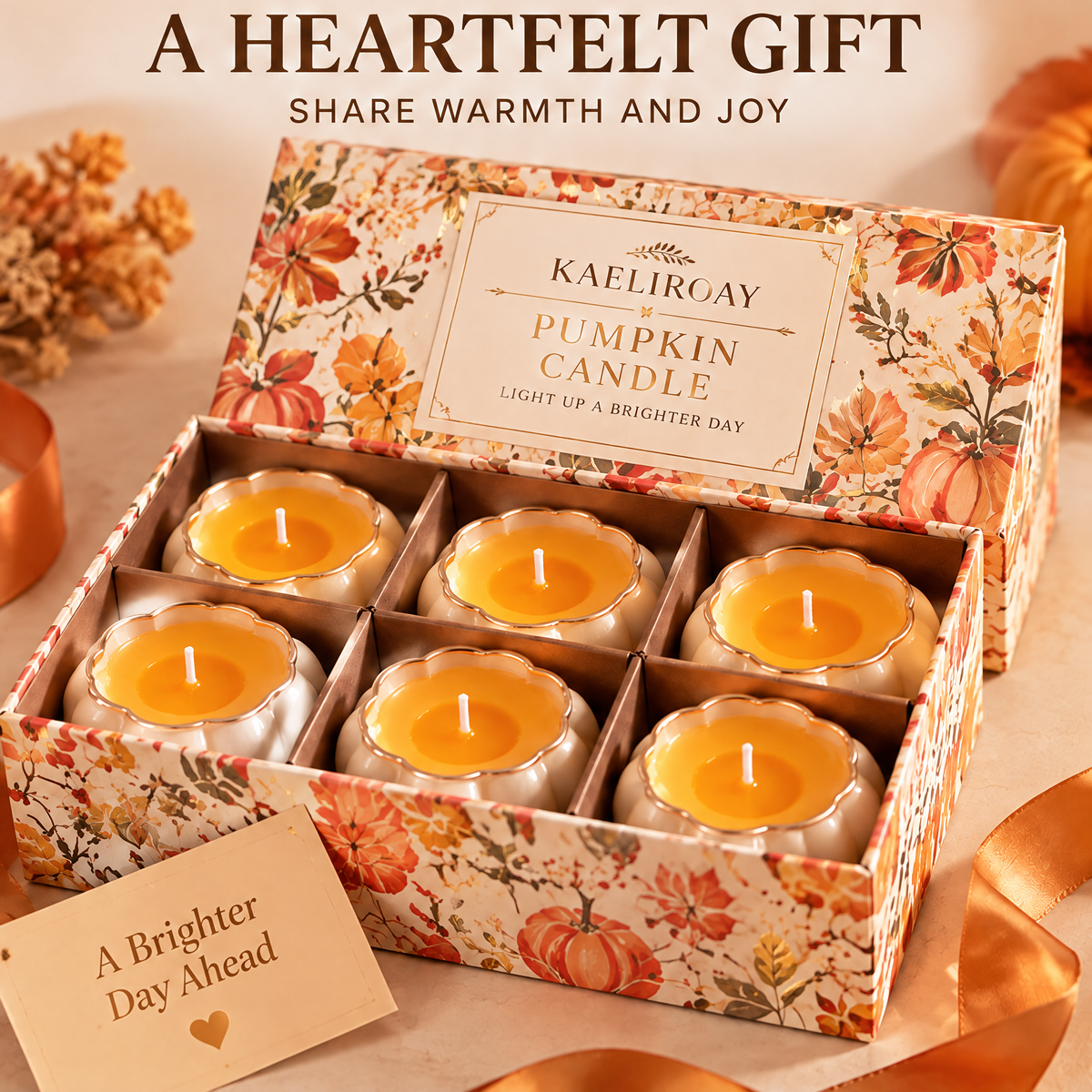 KAELIROAY® Pumpkin Candle Set of 6 — A Heartfelt Gift, Share Warmth and Joy. Six candles in KAELIROAY Pumpkin Candle autumn botanical gift box with ‘A Brighter Day Ahead’ gold heart card. Light Up A Brighter Day.